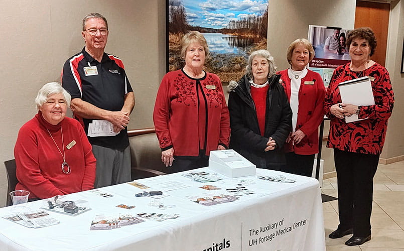 Volunteers at UH Portage Medical Center staffing the Medical Guardian table