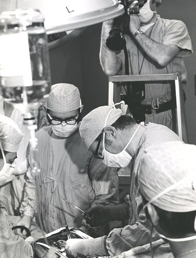 Jay Ankeney, MD, performing surgery circa 1972