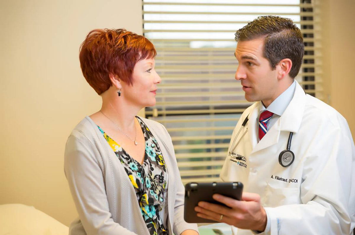 Patient confers with her primary care provider
