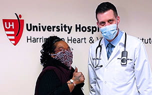 Katrina Cox gives the thumbs up with Dr. James Cireddu at UH Harrington Heart & Vascular Institute