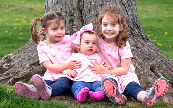 After undergoing  thrombectomy, angioplasty and stenting procedures to clear a DVT clot and open her veins Sarah was able to have these three daughters.