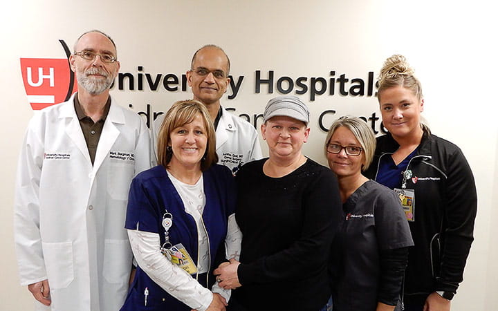 Bonita Johnson (center) and her care team (l to r): Mark Bergman, MD, Lori Gaines, RN, Amitabh Goel, MD, Stacy Izzi, MA, Breanne Hennesey, RN, Assistant Nurse Manager