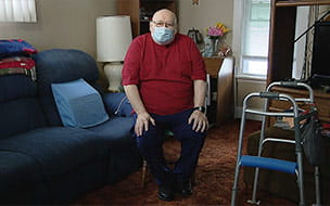 John Potocnik being interviewed in his home