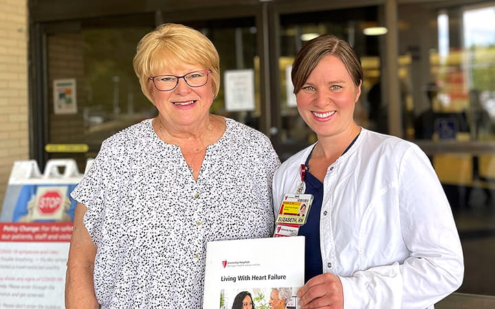 Christine Rand stands with Elizabeth Prahst, RN outside UH Parma Medical Center