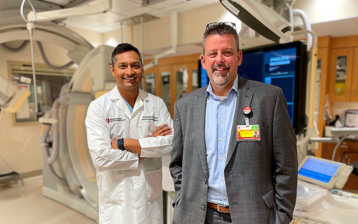 Abhishek Ray, MD and Eric Hess in the MRI room