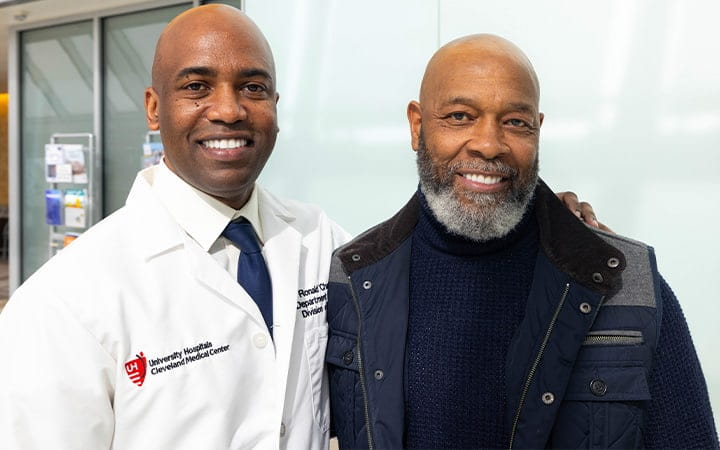 Dana Saunders Sr. poses with Ronald Charles, MD