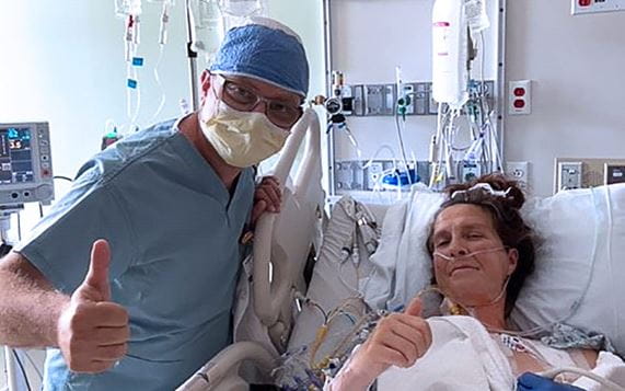 Dr. Abu-Omar and Lynn Ulatowski in the hospital.