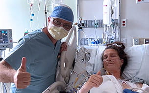 Dr. Abu-Omar and Lynn Ulatowski in the hospital.