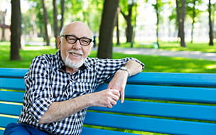 older man on park bench