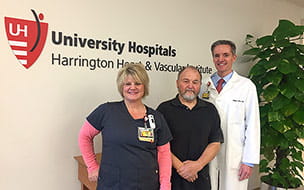 Mike Webster stands in the hallway of UH Harrington Heart and Vascular Institute