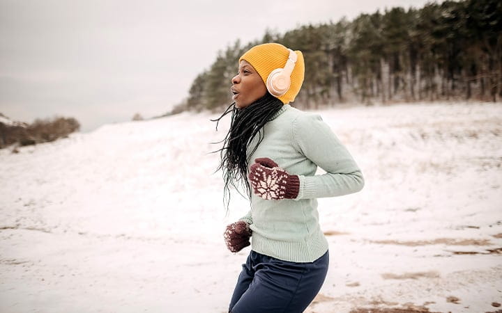 woman running outside in winter