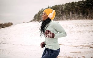 woman running outside in winter