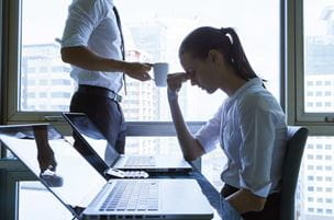 Female office worker under stress
