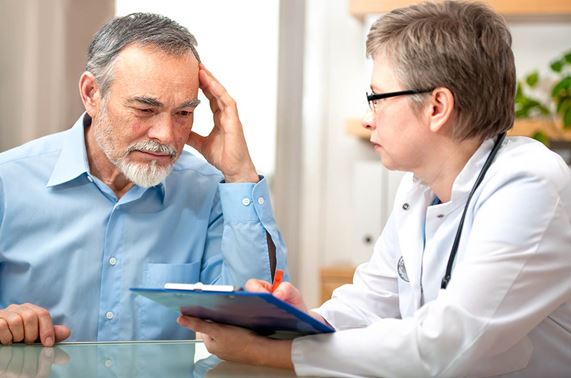man talking with doctor