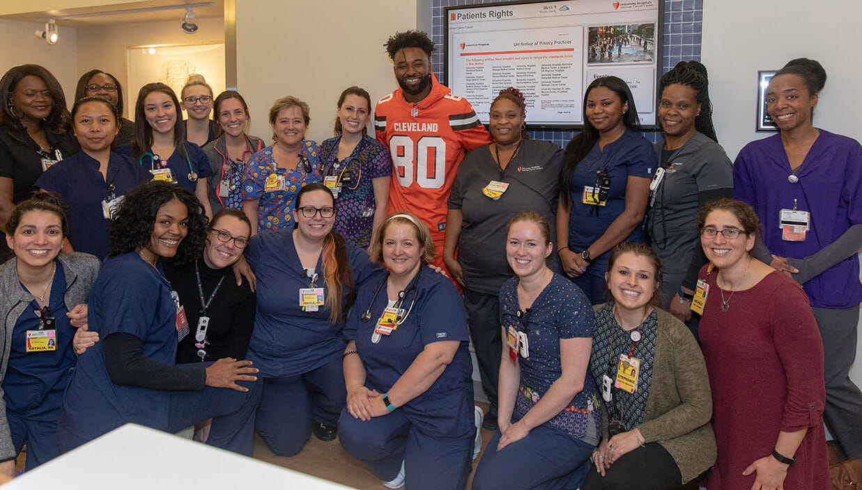 Browns player Jarvis Landry with University Hospitals staff