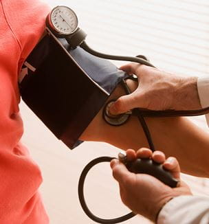Image of patient blood pressure being taken