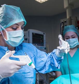 Surgeon performing minimally invasive surgery