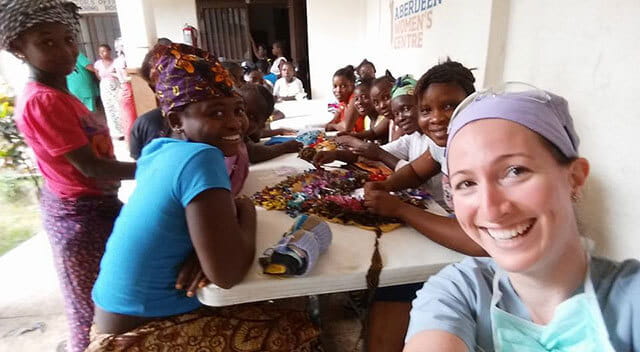Rachel Pope, MD in Sierra Leone with patients