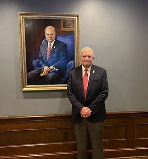 George Thompson, MD with Portrait from Ceremony