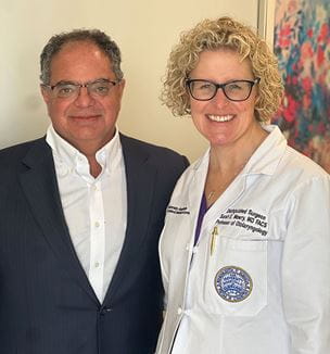 Cliff Megerian, MD and Sarah Mowry, MD pictured at the Megerian Chair ceremony