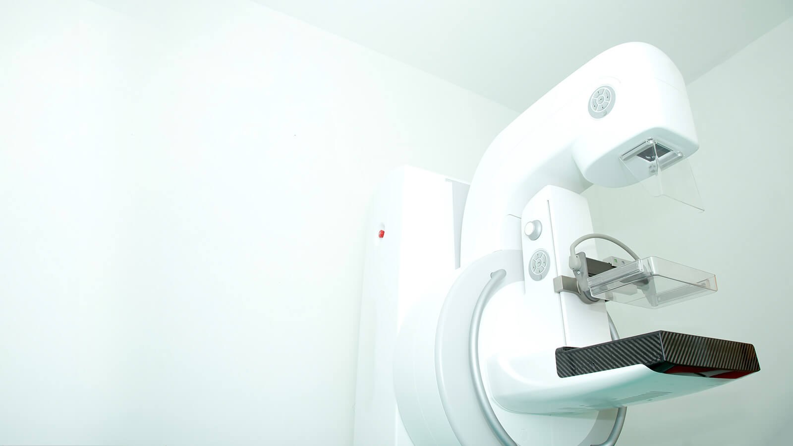 Background image of a radiology machine