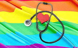 LGBTQ+ Flag with Stethoscope and Heart for Gender Care