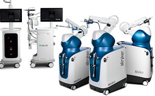 Multiple robotic-assisted joint replacement machines