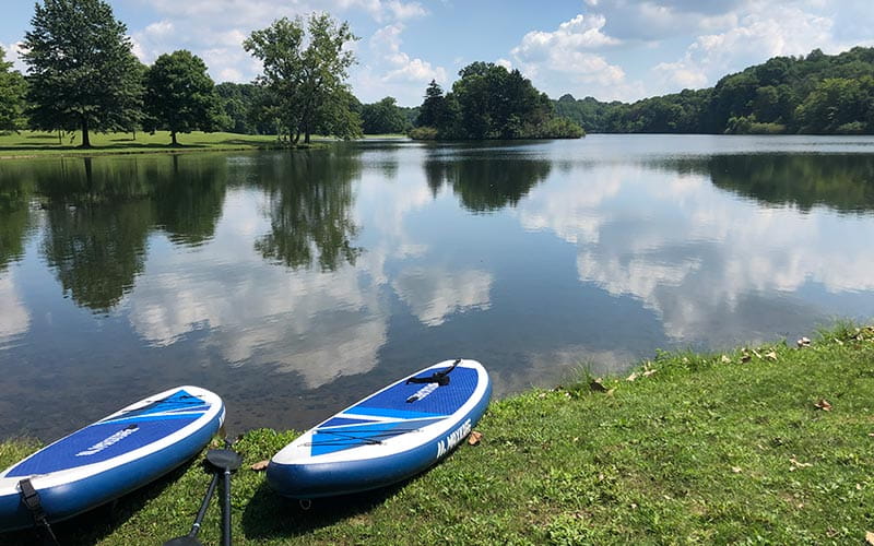 kayaks in front of lake at wellness retreat 