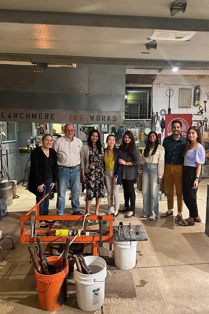 group at glass blowing event