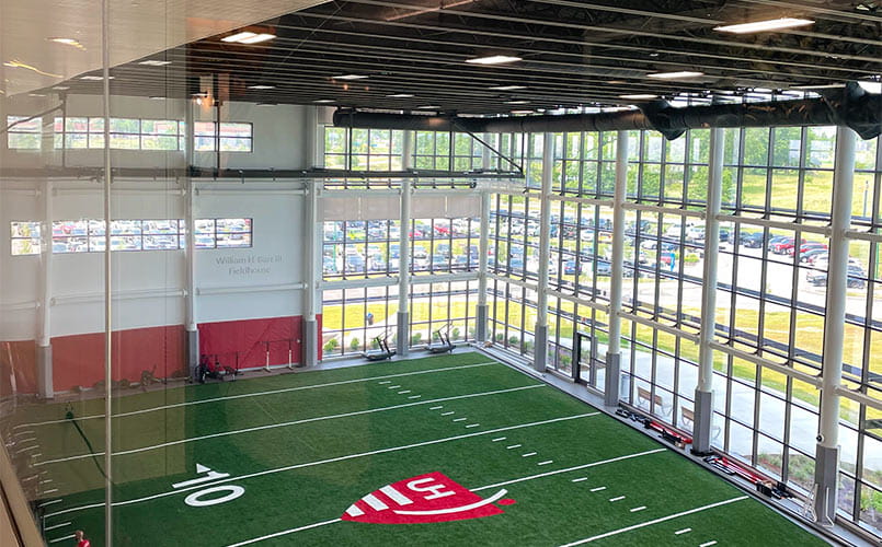 Skybox view of the full-length football field on the first floor