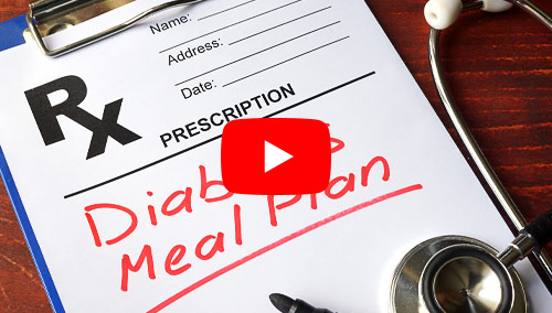 A prescription form with the words "Diabetes meal plan" written in red ink