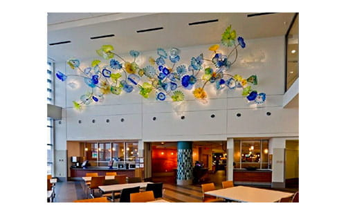Dale Chihuly, Ahuja Azure, Citron and Amber Persian Wall, glass and aluminum, 2010