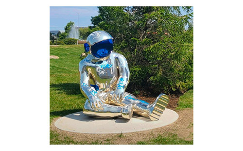 Brenden Murphy, Sitting Spaceman, carbon fiber with chrome finish, 2024