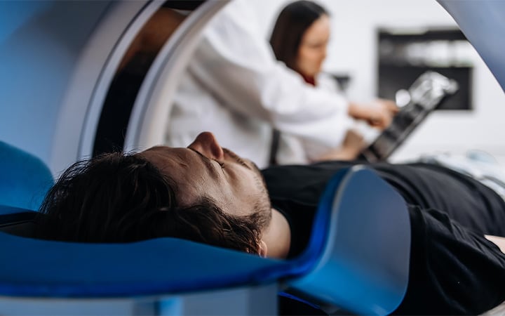 A patient undergoes a full-body scan