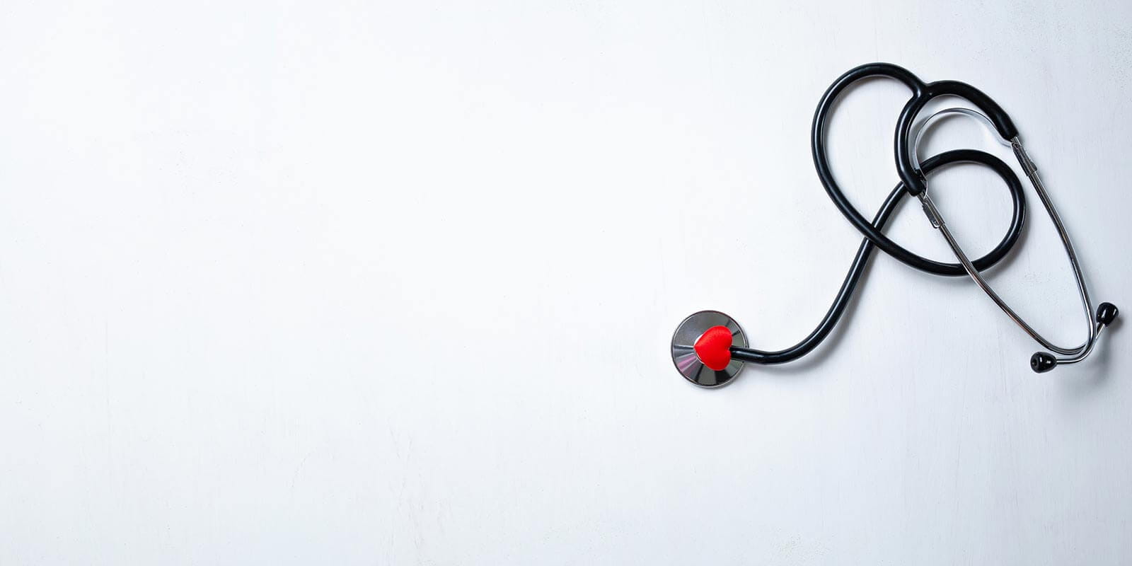 Stethoscope on white table