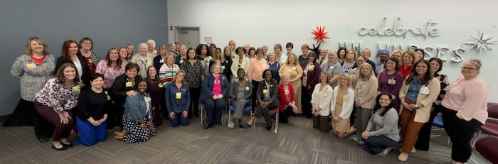 2026 UH 40+ years group shot of tenured nurses at celebration event.
