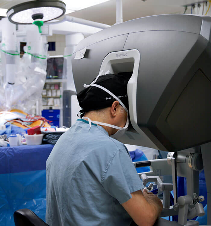 Yasiir Abu-Omar, MD during cardiac robotic surgery at UH.