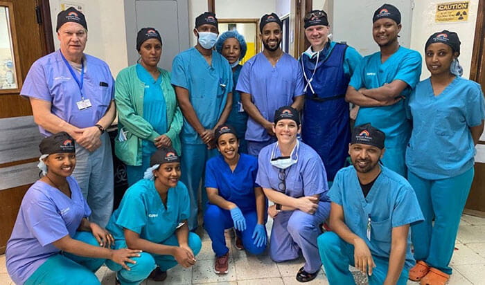 Dr. Christine Hardesty with group of physicians and residents 2025 Medical Mission to CURE Children's Hospital of Ethiopia.