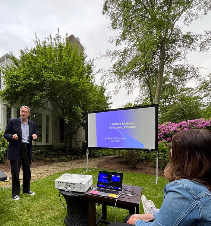 Dan Cooperman presenting fracture remodeling during our outdoor academic session in Mike Glotzbecker’s backyard.