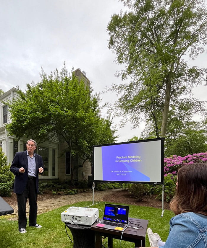 Dan Cooperman presenting fracture remodeling during our outdoor academic session in Mike Glotzbecker’s backyard.