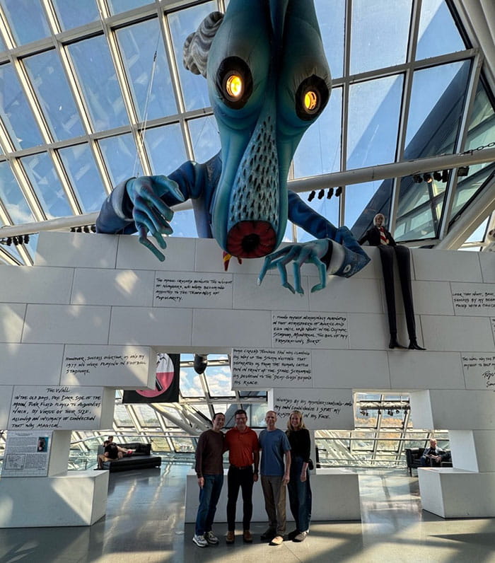 Drs. Ray Liu, Mike Glotzbecker, Eric Edmonds, and Kate Hollnagel in front of the Pink Floyd exhibit at the Rock and Roll Hall of Fame.