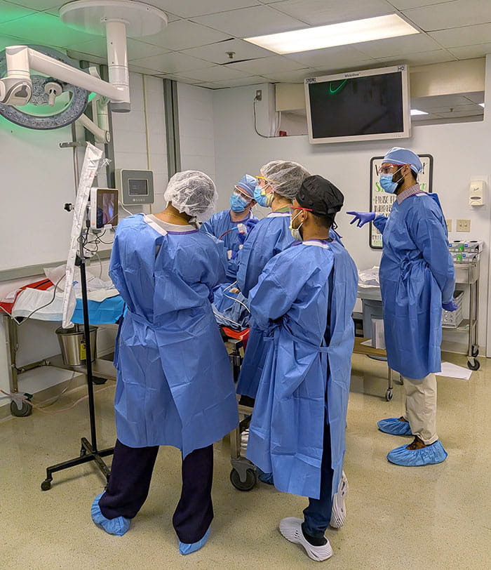 Pulmonary and critical care fellows practice airway foreign body removal in a human cadaveric model using a variety of tools via flexible bronchoscopy."