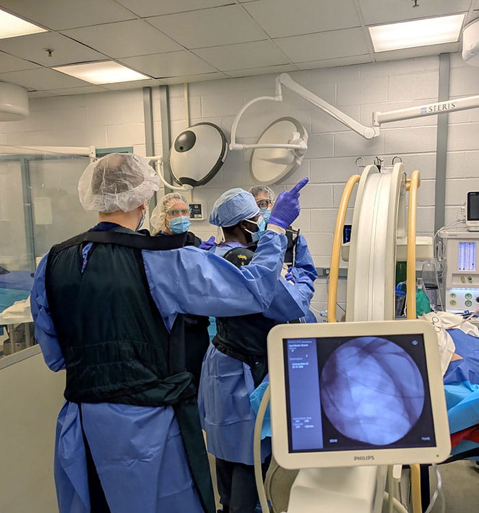 High-fidelity human cadaver-based simulation is used to train pulmonary and critical care medicine fellows fluoroscopically guided transbronchial biopsy. Additionally, equipment has been set up to simulate hemoptysis with subsequent bronchial blocker placement for management.