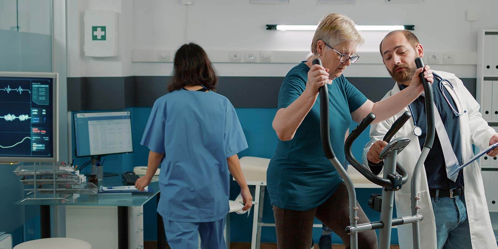 senior patient doing muscle exercise on stationary bike