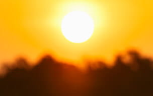Depiction of a blazing sun during a heatwave