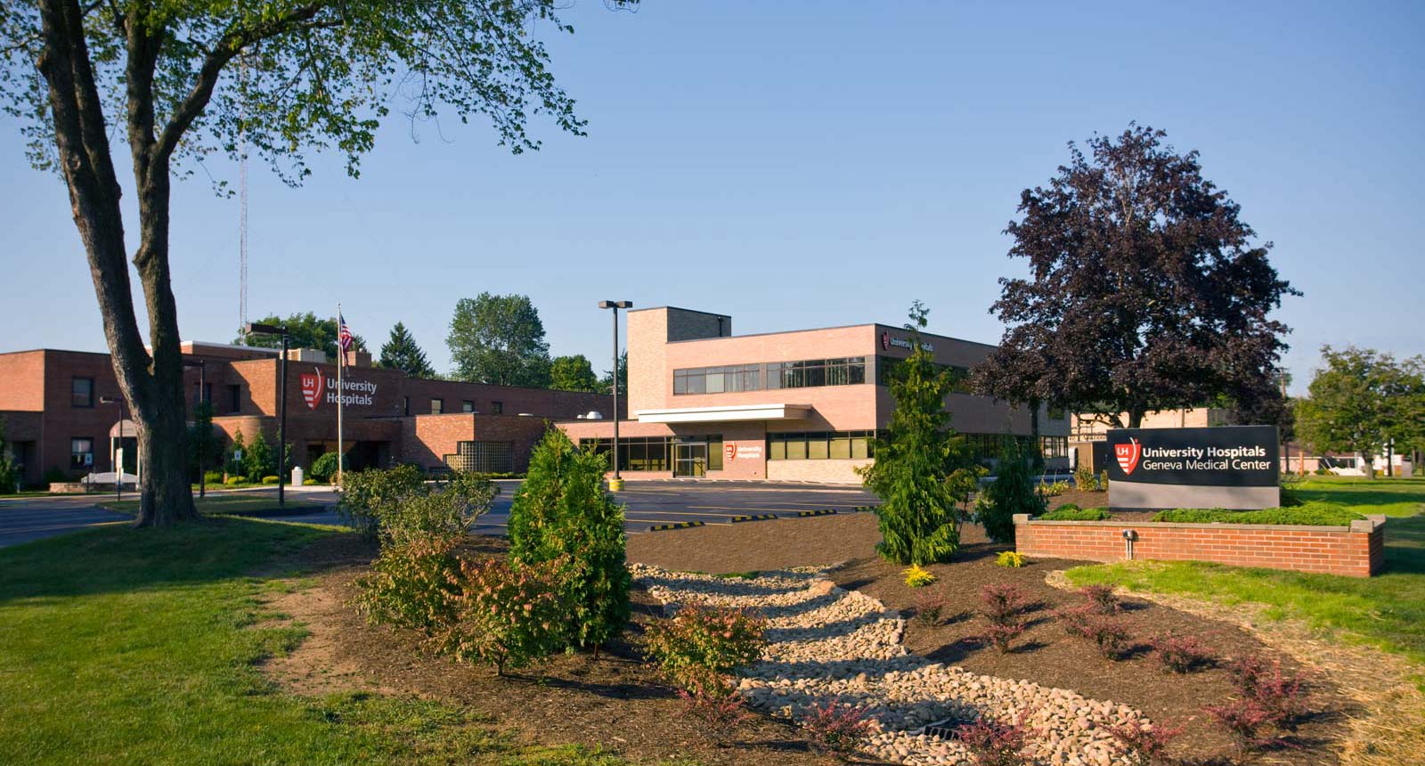 A photograph of the UH Geneva Medical Center Building and Garden.