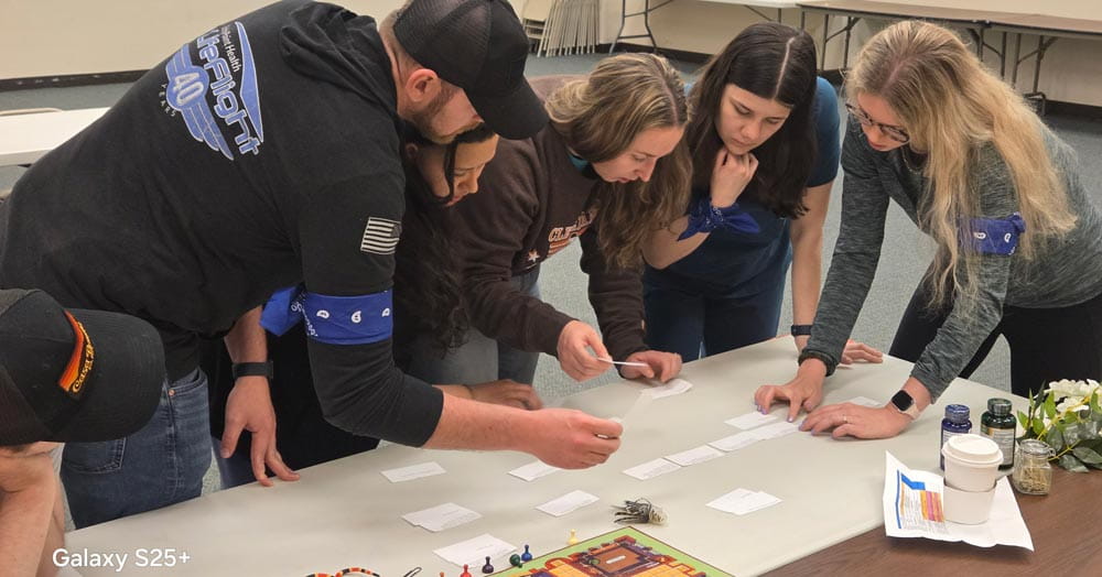 group of residents gathered around an activity