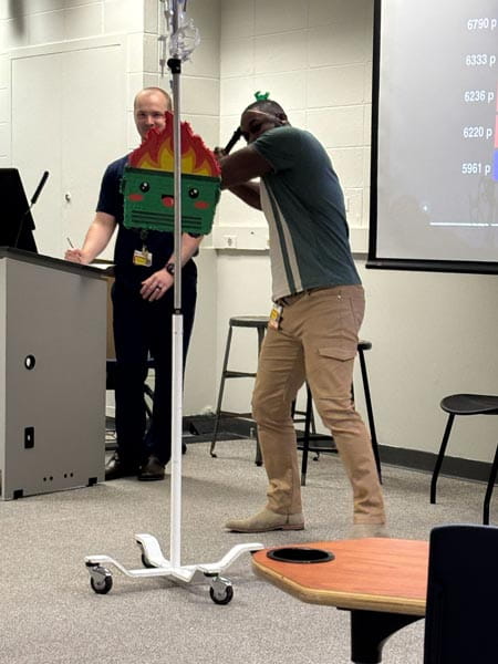resident hitting a pinata