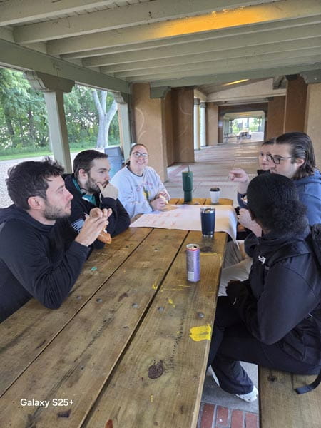 group of residents at the park having a picnic