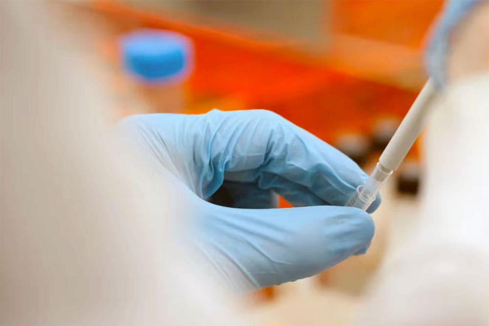 researcher conducting research in a lab